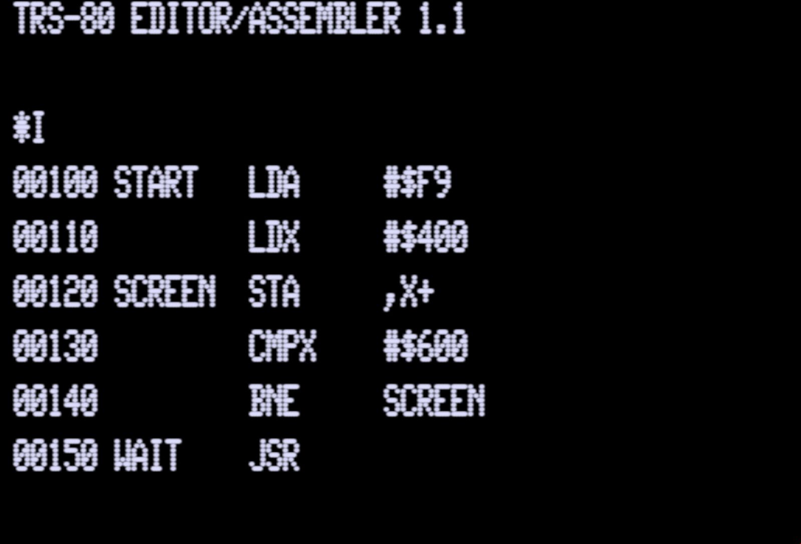 An assembly language code snippet for the TRS-80 computer system. It includes commands like LDA, LDX, and STA, along with memory addresses #$400 and #$600. Labels such as START, SCREEN, and WAIT are used to structure the code.